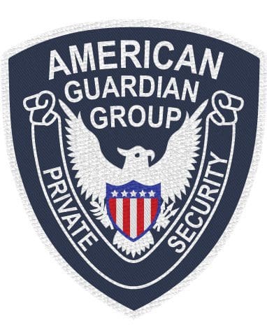 Embroidered patch American guardian group a private security with black background and white eagle in the middle. close-up of a patch patch with a white eagle and white stripes