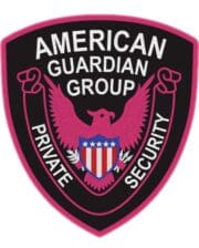 Embroidered patch American guardian group a private security with black background and pink eagle in the middle. close-up of a patch