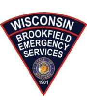 sewable patches Wisconsin Brookfield Emergency Services patch. a black triangle with white text a triangle sign with white text and blue text