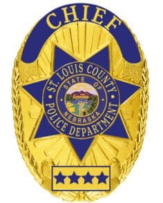 Badge for police st. Louis county police department gold badge with nebraska state seal and star in the middle.