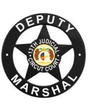 Deputy marshal badge a circular black and white sign with a star and text