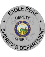 Custom iron on patches Eagle peak Sheriff department a circular grey badge with a blue and yellow circle with black text