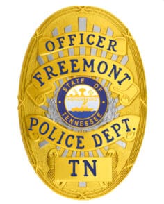 police badge officer Freemont Police department a gold badge with blue text