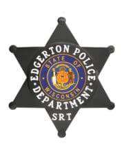 custom police badge Edgerton police department black badge with white text a close-up of a police badge