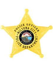 police officer gold badge with black text a yellow star shaped badge