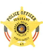 Police officer badge a yellow star shaped badge with a flag and text