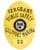 police badge a yellow badge with black text and a white circle