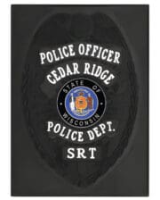 police officer badge black with white text a close-up of a badge