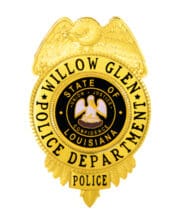 police gold badge with a black circle and a black and white circle with a bird on it