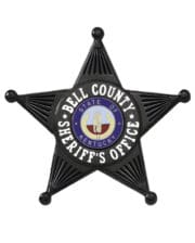 Badge Shariff black star shaped badge with white text Bell county sheriff badge