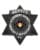 Deputy Sheriff badge a black star shaped badge with white text