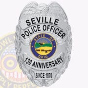 Personalized Police Badges: Do Personalized Badges Represent Law Enforcement Identity a police badge with a black background