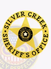 A custom metal badge in gold color with safety pin attachment, designed in a star shape. The badge features "SILVER CREEK" and "SHERIFF'S OFFICE" in bold black lettering around the edge. In the center, it displays the state emblem of Texas, surrounded by a circular border, showcasing its vibrant and official appearance suitable for law enforcement personnel.