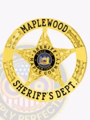 A custom metal badge in gold color with safety pin attachment, featuring a star shape. The badge showcases "MAPLEWOOD" and "SHERIFF'S DEPT." in bold black letters around the edge. In the center, it displays the emblem for the state of New York, creating a striking design that signifies authority and professionalism for law enforcement personnel.