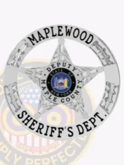 A custom metal badge in silver color with safety pin attachment, designed in the shape of a star. The badge features "MAPLEWOOD" and "SHERIFF'S DEPT." in bold black lettering around the outer edge. In the center, it displays "DEPUTY" along with the emblem for the state of New York, contributing to its official and authoritative appearance suitable for law enforcement personnel.